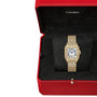 A Cartier Panthère De Cartier Watch in 18K yellow gold, with a diamond-encrusted band, is displayed elegantly in an open red box featuring a black interior.