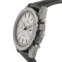 Side view of the OMEGA Speedmaster Dark Side of the Moon Grey Side Edition, featuring a silver dial with three subdials, tachymeter bezel, black leather strap, and powered by the Co-Axial calibre 9300.