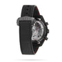 The OMEGA Speedmaster Dark Side Of The Moon Sedna Black is a black wristwatch with a visible mechanical movement on the back, black ceramic case, and a black leather strap with red stitching.
