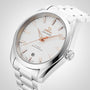 OMEGA Seamaster Aqua Terra 150M wristwatch with a white patterned dial, rose gold markers and hands, and a metal bracelet, displayed at an angle.