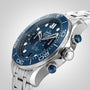 Close-up of the OMEGA Seamaster Diver 300M, an iconic watch with a stainless steel case, blue dial, rotating bezel, silver bracelet, chronograph subdials, and luminous hour markers.