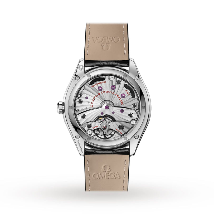 Back view of the OMEGA De Ville Trésor reveals the Master Co-Axial Calibre 8910 through its transparent case, paired with a beige leather strap featuring the OMEGA logo.