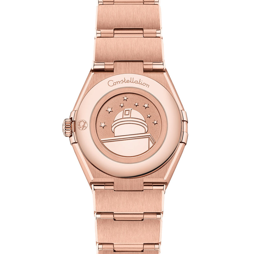 The OMEGA Constellation watch features a rose gold case with an engraved observatory dome, eight stars, Constellation, and is crafted in exquisite 18K Sedna™ gold.
