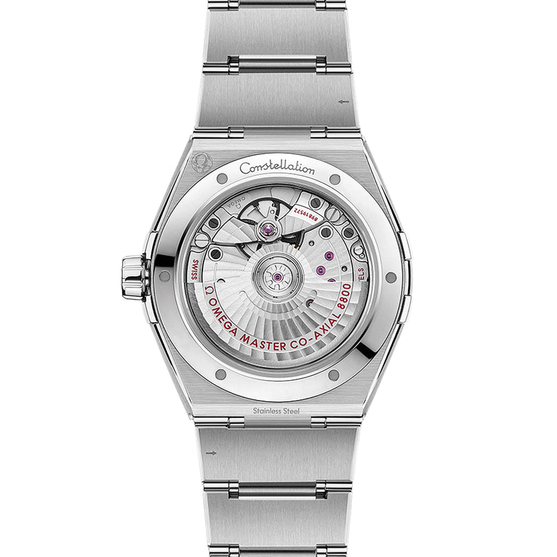 The back of the OMEGA Constellation showcases its exposed mechanical movement, engraved details, and the precision of a Co-Axial Master Chronometer on the stainless steel case and rotor.