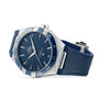 An OMEGA Constellation wristwatch with a stainless steel case, blue face, blue ceramic bezel, Roman numerals, and a matching blue leather strap is displayed against a white background.