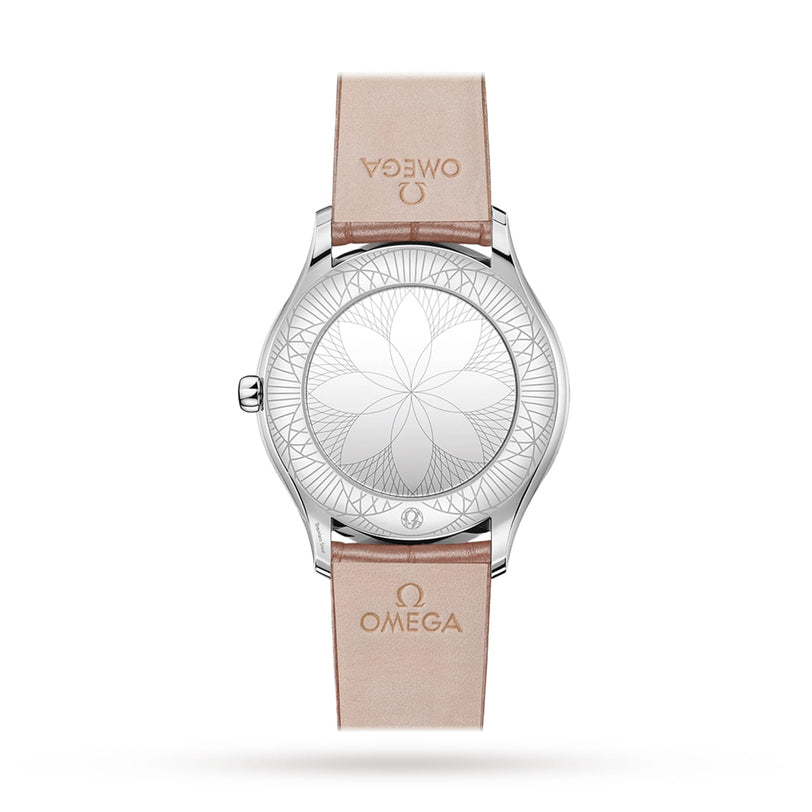 The OMEGA De Ville Trésor features a mother-of-pearl dial, a beige leather strap with the Omega logo, and a silver case back engraved with a geometric floral pattern.