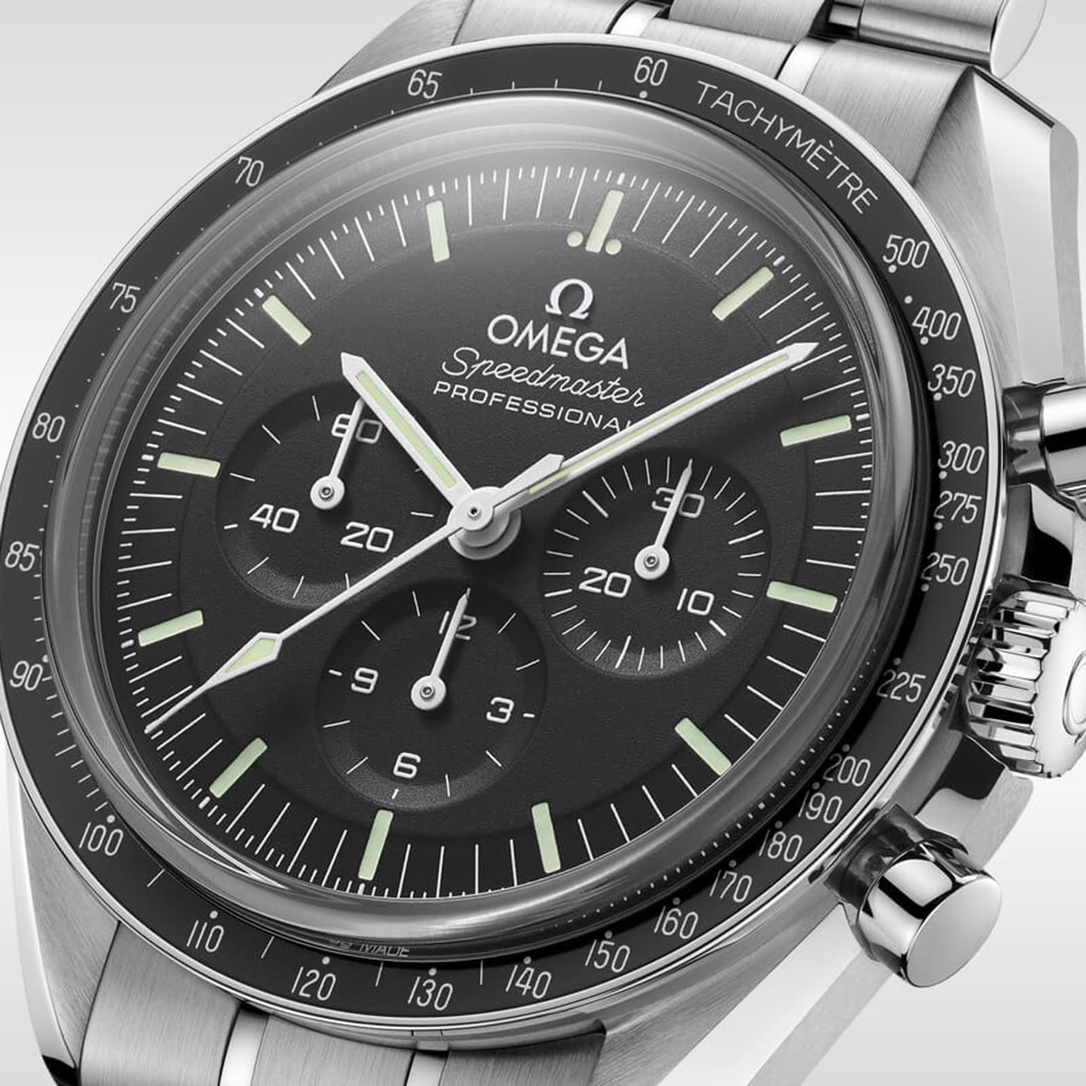 Close-up of the OMEGA Speedmaster Moonwatch Professional, a stainless steel wristwatch featuring a black dial, three subdials, and a tachymeter bezel.
