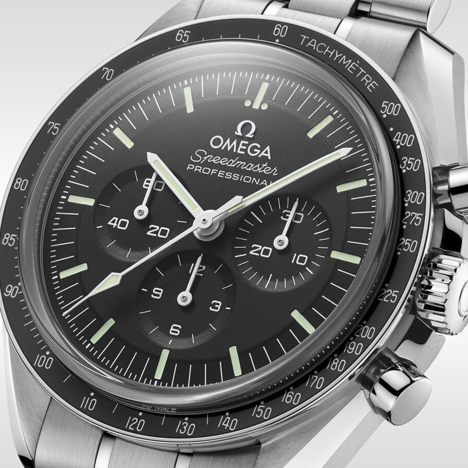 Close-up of the OMEGA Speedmaster Moonwatch Professional, a stainless steel wristwatch featuring a black dial, three subdials, and a tachymeter bezel.