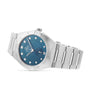 The OMEGA Constellation is a 34mm stainless steel wristwatch featuring a blue dial, Roman and diamond hour markers, and a link bracelet, shown at an angle on a white background.