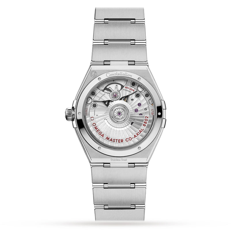 Back view of the OMEGA Constellation stainless steel watch displaying its exposed mechanical movement and Co-Axial Master Chronometer 8902 engraving.