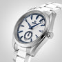 The OMEGA Seamaster Aqua Terra 150M wristwatch features a silver case, white dial, blue hour markers, and a metal bracelet. Displayed on a light gray background, it honors OMEGA’s maritime heritage with Master Chronometer certification.