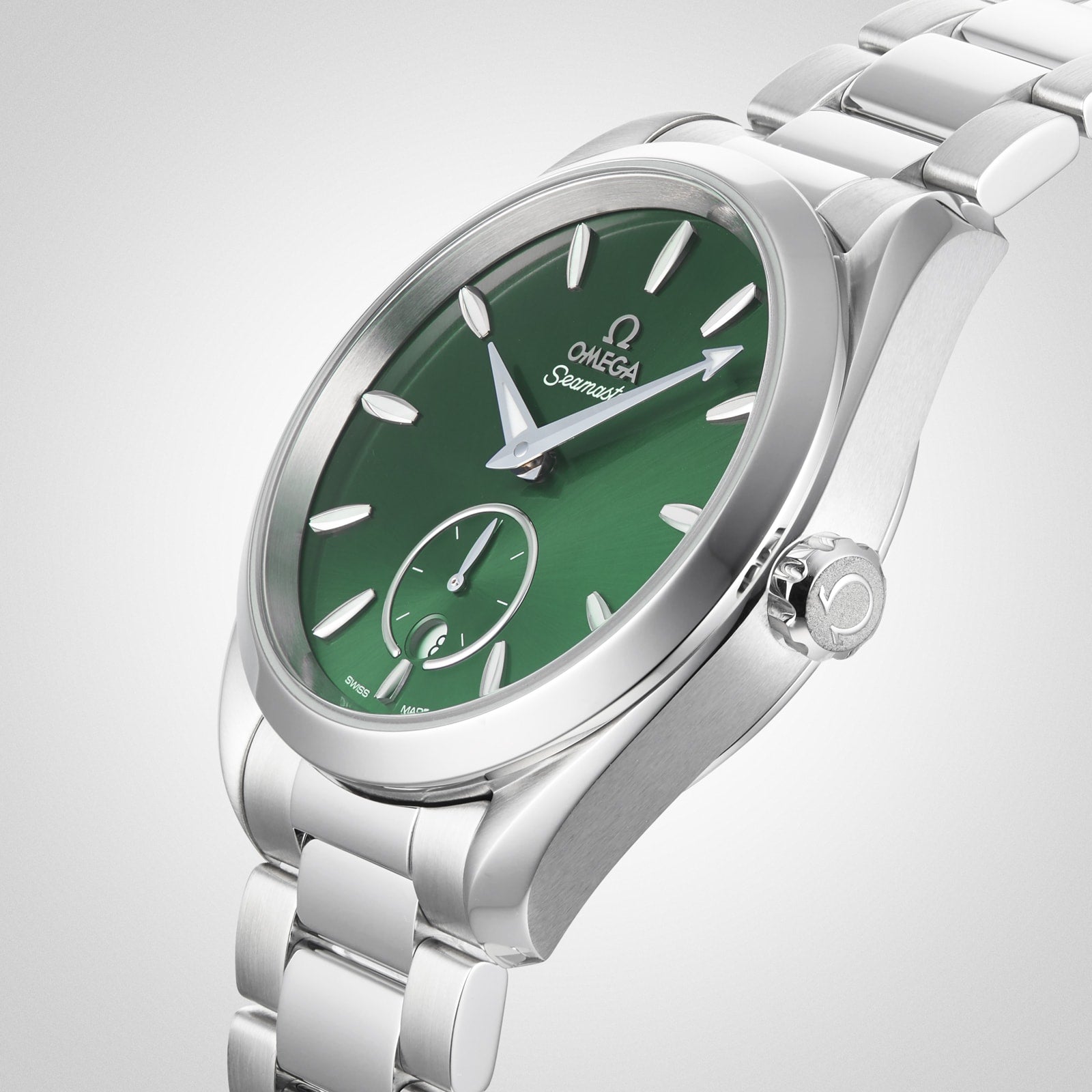 A close-up of the OMEGA Seamaster Aqua Terra 150M, featuring a green dial, silver markers, stainless steel bracelet, and precise 8802 calibre movement.