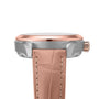 Side view of an OMEGA Seamaster Aqua Terra 150M with a rose gold bezel, silver case, and light brown leather strap showcasing visible stitching.