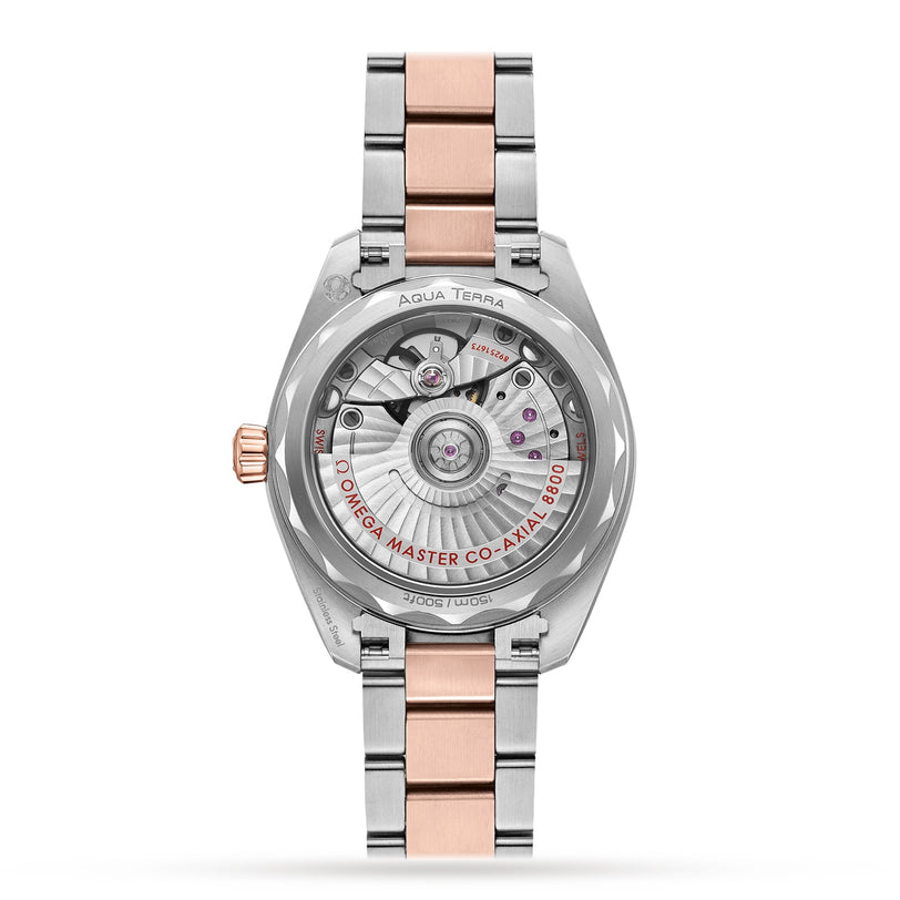 Back view of the OMEGA Seamaster Aqua Terra 150M ladies watch in two-tone stainless steel and rose gold, revealing its engraved details and exposed mechanical movement through a transparent caseback.