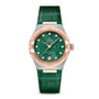 The OMEGA Constellation features a green textured dial with diamond hour markers, date display, and an 18K Sedna™ gold rose bezel, complemented by a green leather strap and proudly displaying the OMEGA logo on the dial.