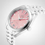 The OMEGA Seamaster Aqua Terra 150M, a stainless steel watch with a pink dial, silver hour markers, and date at 6 o’clock, features the precise 8800 calibre movement and is shown angled on a light background.