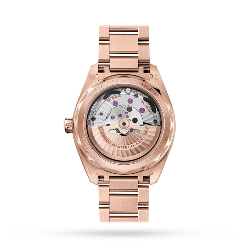 A rose gold OMEGA Seamaster Aqua Terra 150M wristwatch shown from the back, highlighting its transparent case, visible mechanical movement, and engraved details in luxurious 18K Sedna™ gold.