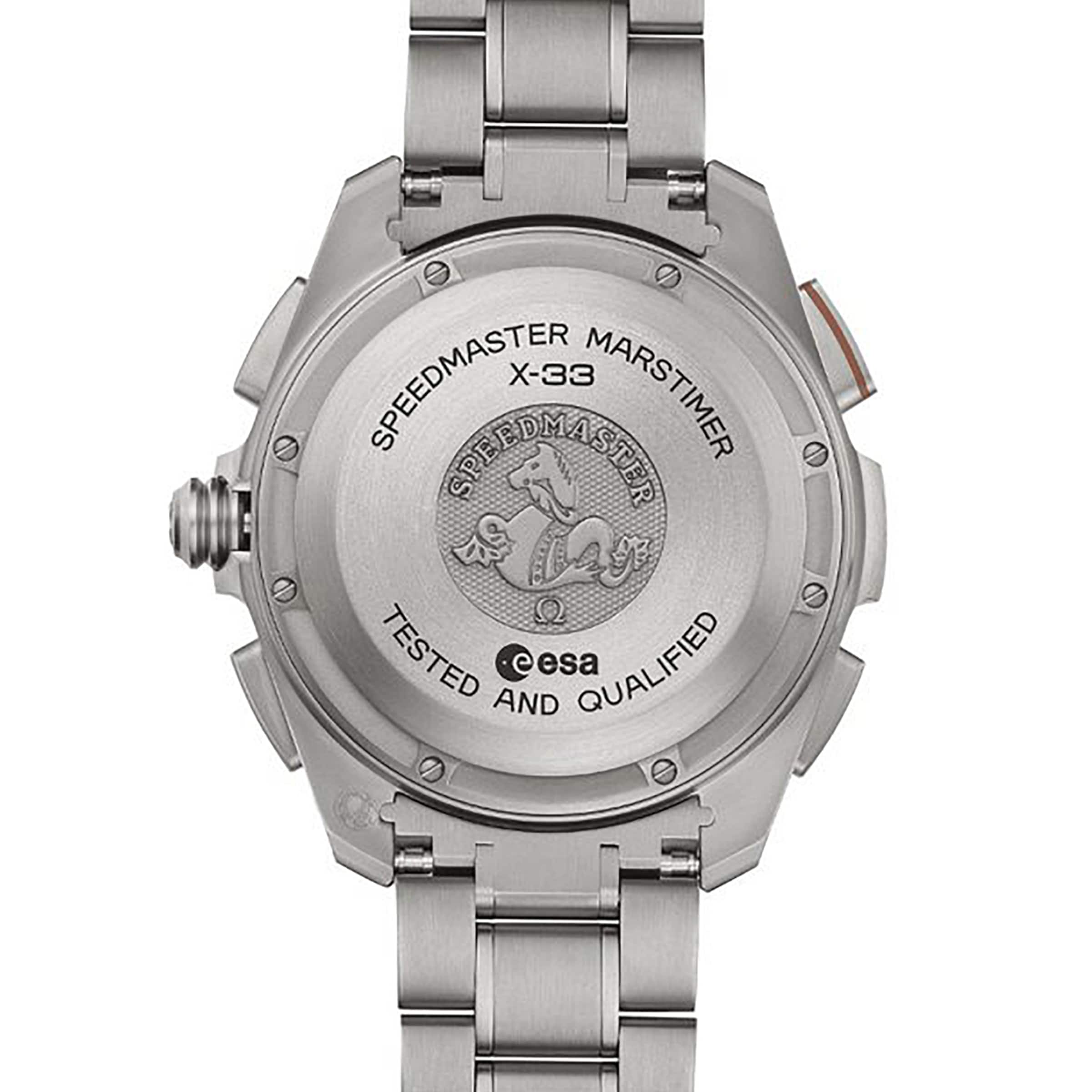 Back view of the OMEGA Speedmaster X‑33 Marstimer, featuring a titanium case, engraved text, ESA logo, and metal bracelet.