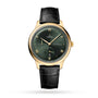 The OMEGA De Ville Prestige features a gold case, dark green Roman numeral dial, date at 6 o’clock, power reserve indicator, and black leather strap—an elegant icon of classic design.