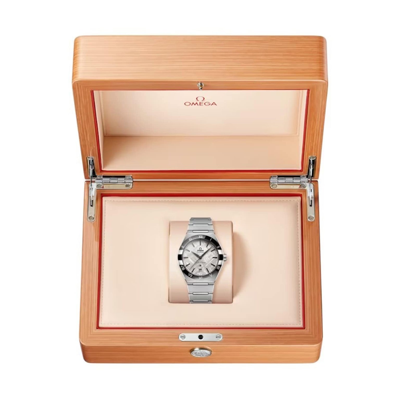 An OMEGA Constellation wristwatch with a meteorite dial is displayed inside an open wooden OMEGA box with a beige interior.