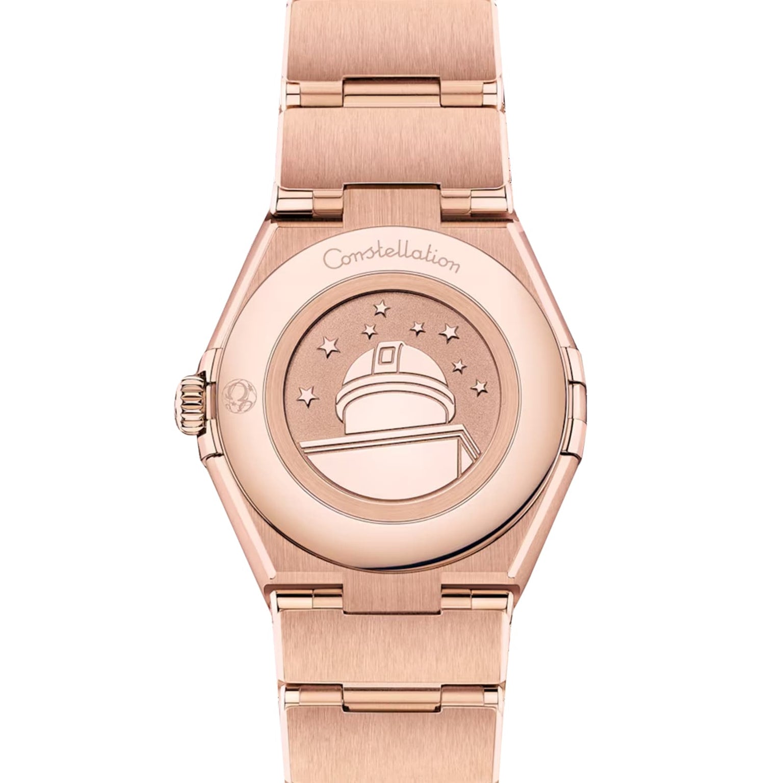 A close-up of the back of an OMEGA Constellation wristwatch, featuring an engraved observatory and stars in 18K Sedna™ Gold, with Constellation inscribed above the illustration.