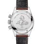 The back of the OMEGA Speedmaster Anniversary Series watch is engraved with “THE FIRST OMEGA IN SPACE,” a horse and seahorse illustration, the date “OCTOBER 3, 1962,” and features its iconic tachymeter scale.