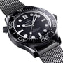 Close-up of the OMEGA Seamaster Diver 300M, featuring a black ceramic case, black rotating bezel, mesh strap, bold white Super-LumiNova hour markers, and a wave-pattern dial.