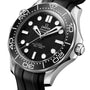 A close-up of the OMEGA Seamaster Diver 300M dive watch featuring a black dial, white markers, rotating bezel, stainless steel case, and black rubber strap.