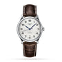 The Longines Master Collection automatic watch features a stainless steel case, white dial with black Arabic numerals, blue hands, brown leather strap, and a date display at 6 oclock.