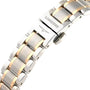 Close-up of a two-tone metal clasp engraved with the Longines logo; silver and gold links highlight the refined style of the Longines Master Collection watch band.