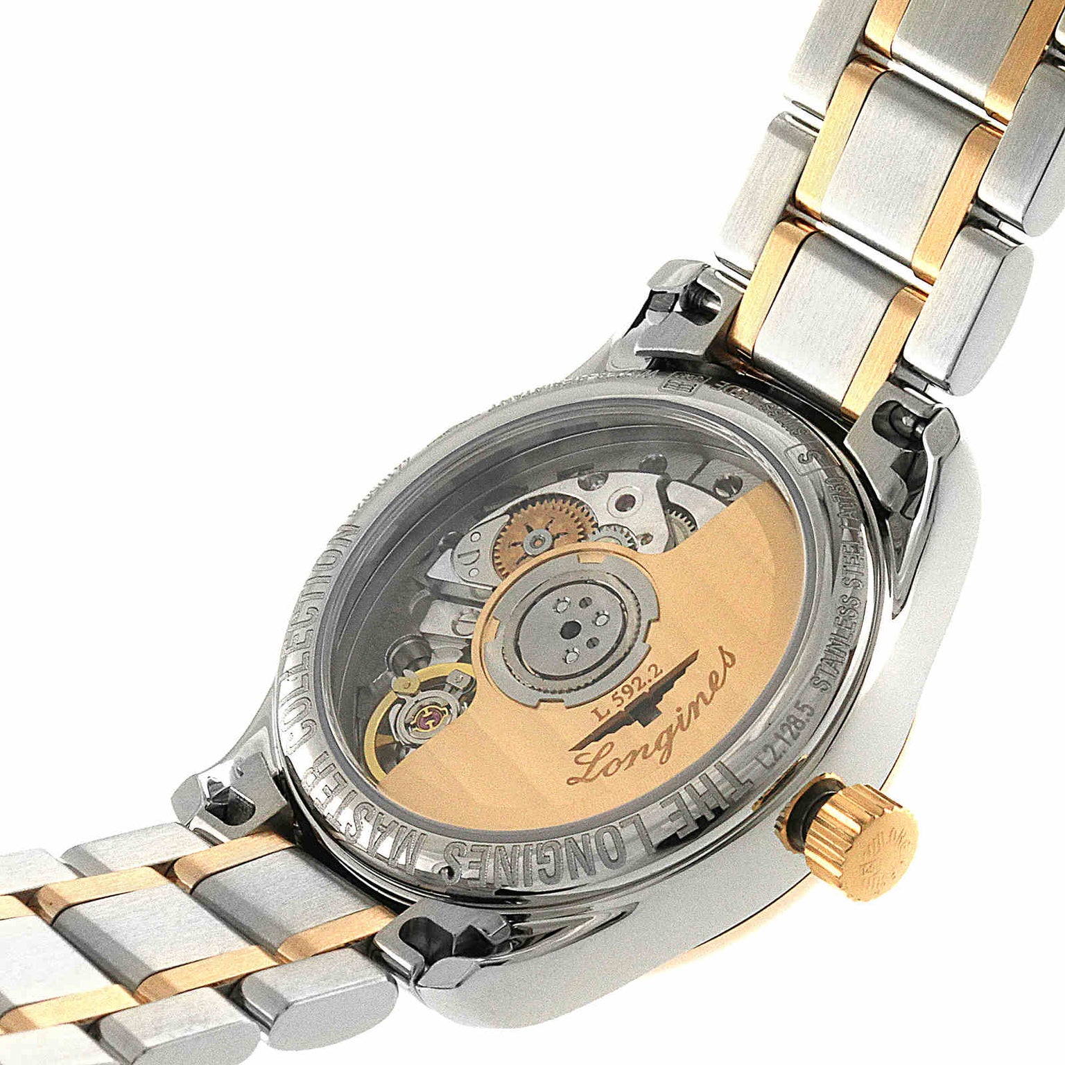 Close-up of the Longines Master Collection wristwatch featuring an exposed mechanical movement through a transparent case back and a stylish two-tone metal bracelet.