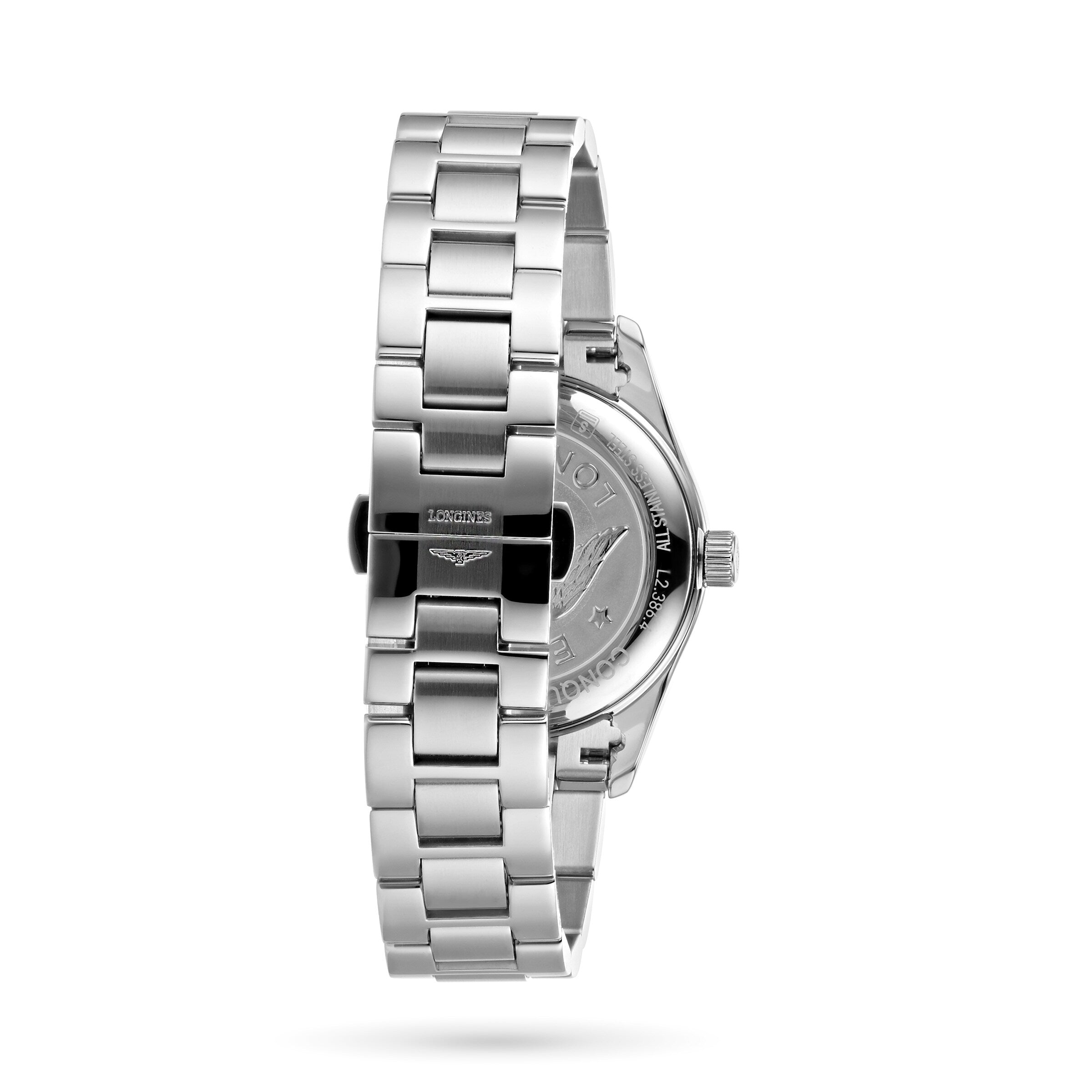 A silver metal wristwatch, the Longines Conquest Classic, is shown from the back, highlighting its engraved stainless steel case and clasp—an elegant nod to its Conquest heritage.