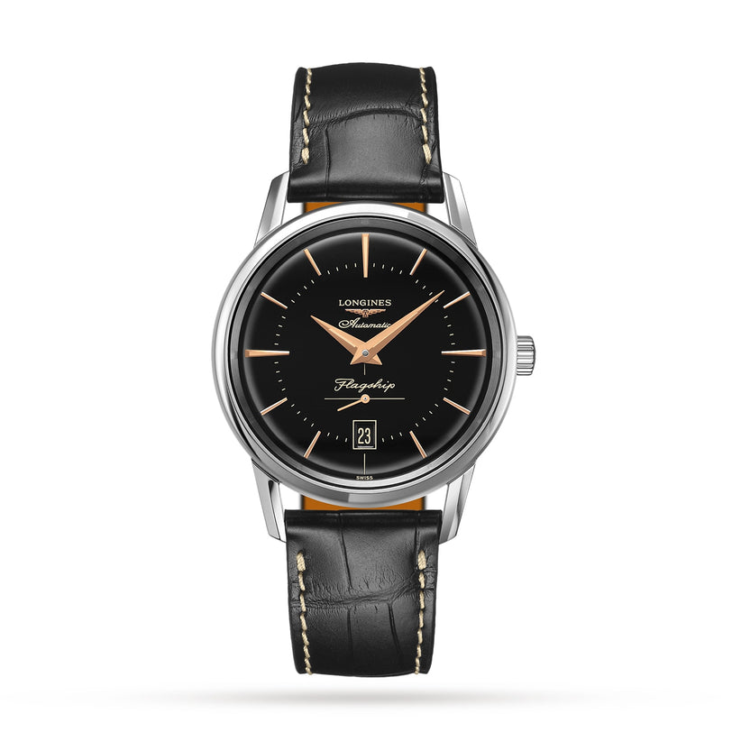 The Longines Flagship Heritage wristwatch features a black dial, silver case, black leather strap, gold hands and indices with Swiss Super-LumiNova, a date display at 6 oclock, and is labeled Flagship Automatic.