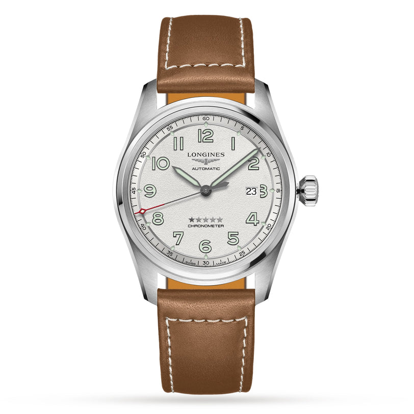 The Longines Spirit features a stainless steel case, white dial with Arabic numerals, date at 3 o’clock, red-tipped seconds hand, and a brown leather strap—reflecting Longines’ renowned craftsmanship and pioneering legacy.
