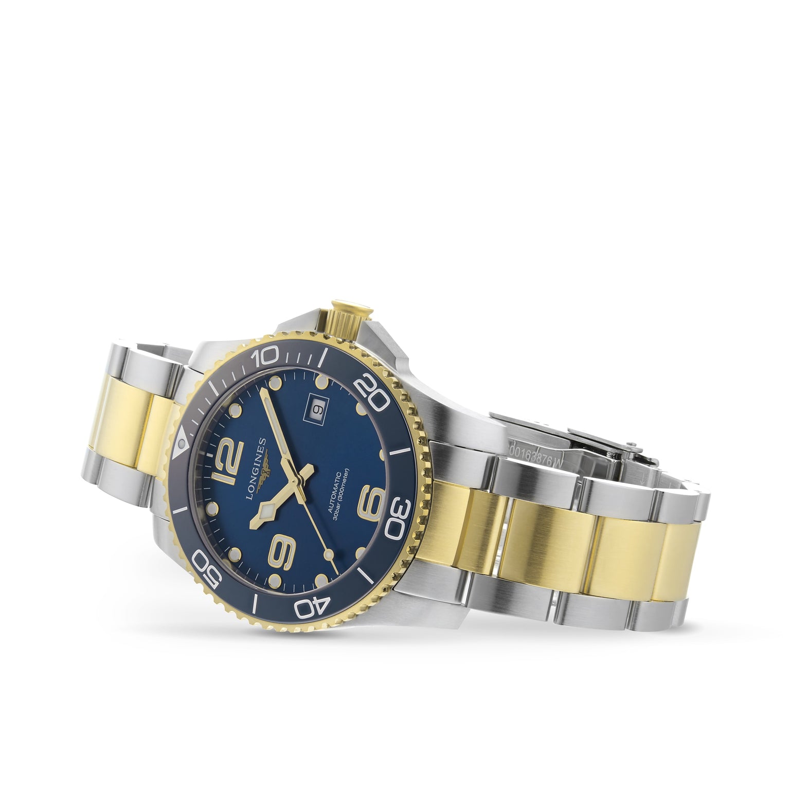 A Longines HydroConquest diving watch featuring a blue dial, date window, and rotating bezel in two-tone stainless steel and gold, photographed at an angle on a white background.