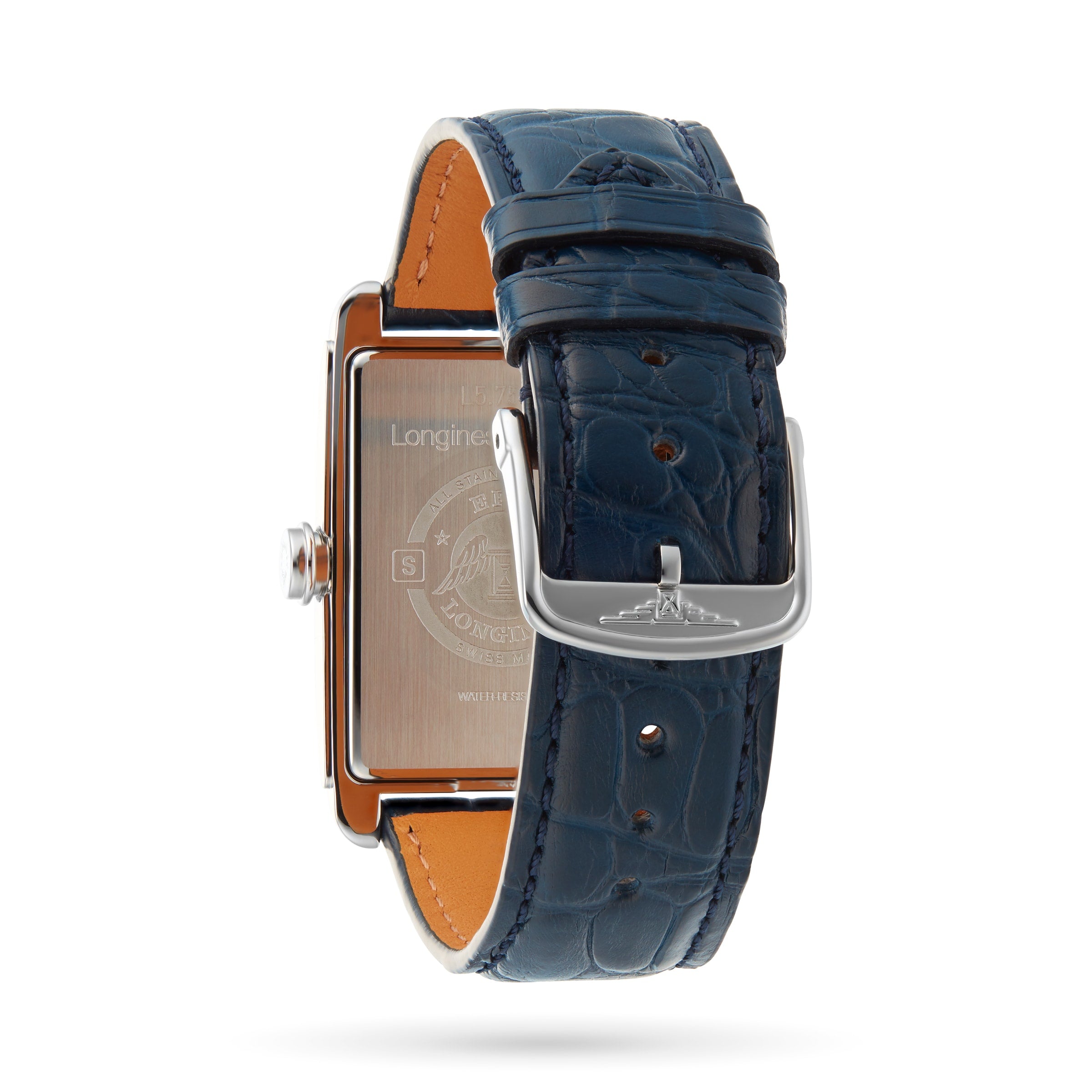 The Longines DolceVita features a rectangular stainless steel case, navy blue leather strap with silver buckle, and an engraved metal case back displaying the Longines logo.