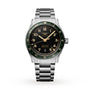 The Longines Spirit Zulu Time is a 42mm stainless steel watch with a black and green bezel, anthracite dial, gold accents, date at 6 o’clock, and a silver metal bracelet inspired by the Spirit collection.