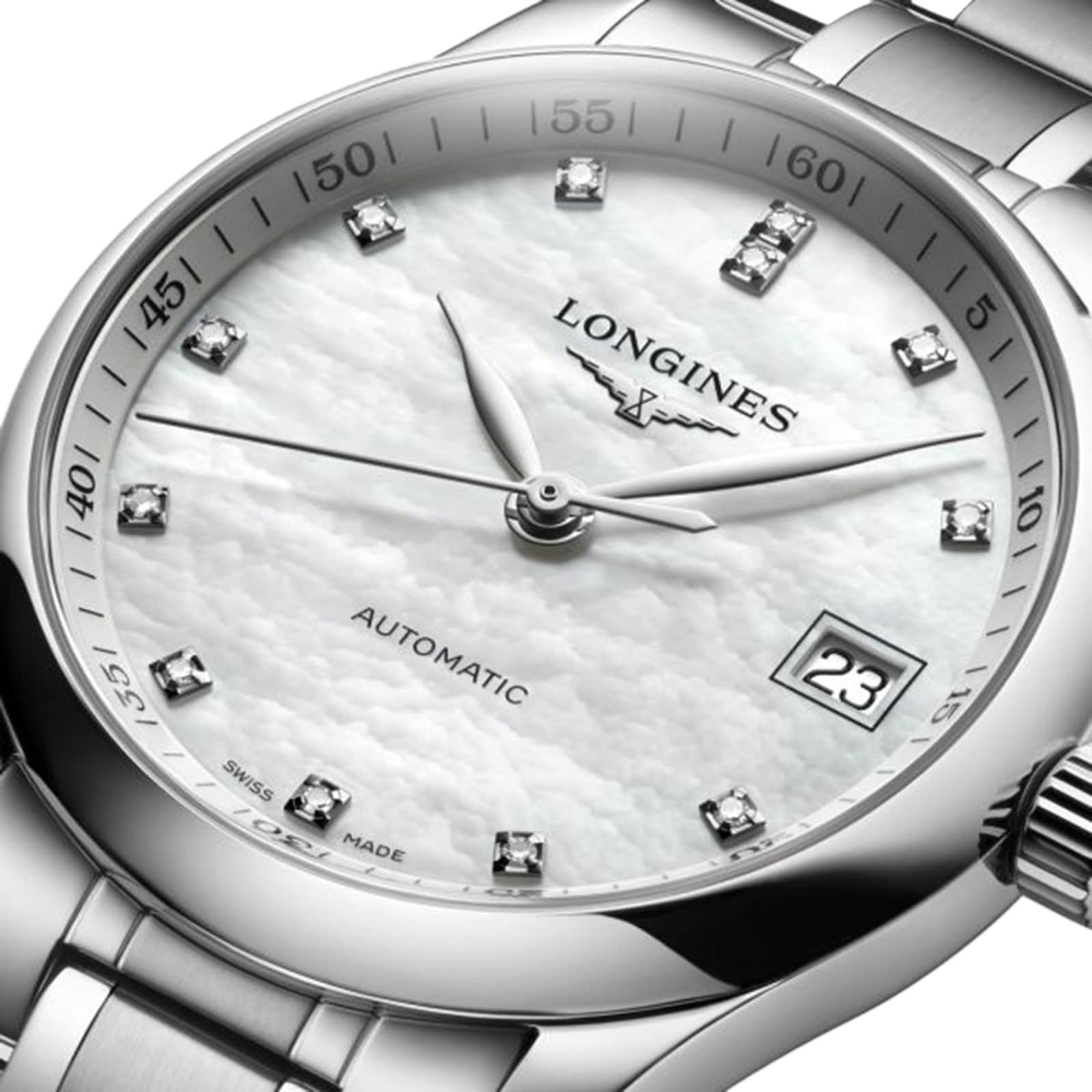 Close-up of the Longines Master Collection wristwatch featuring a silver case, white textured dial, diamond hour markers, and date display at 3 o’clock—a refined showcase of Longines’ craftsmanship.