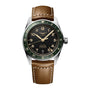 The Longines Spirit Zulu Time features a stainless steel case, brown leather strap, green bezel, black dial with Arabic numerals, and a date display at 6 o’clock.