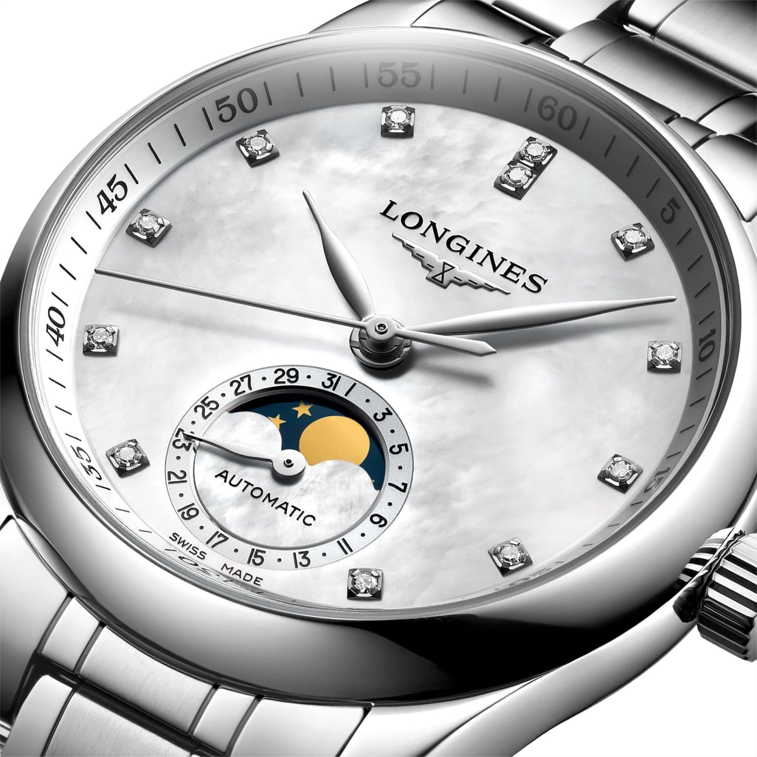 Close-up of the Longines Master Collection Moonphase wristwatch, featuring a silver case, white dial, diamond indexes, and a moonphase subdial with sun and moon design.