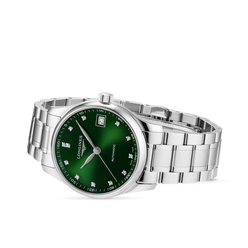 The Longines Master Collection silver wristwatch features a green dial with diamond indexes, date at 3 o’clock, automatic movement, and a stainless steel bracelet.