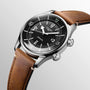 The Longines Legend Diver showcases automatic movement, a black dial with white markers, a rotating bezel, and a brown leather strap—vintage-inspired and elegantly presented at an angle on a light background.