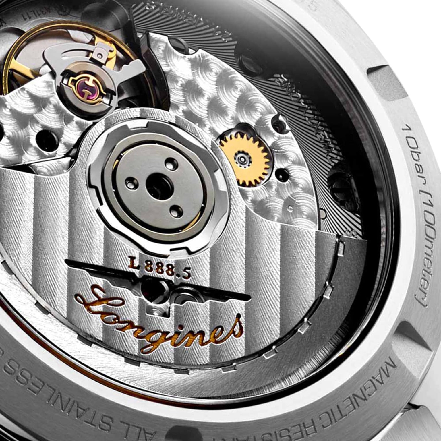 Close-up of a Longines Conquest automatic watch movement displaying gears, rotor, and engraved branding inside a stainless steel case.