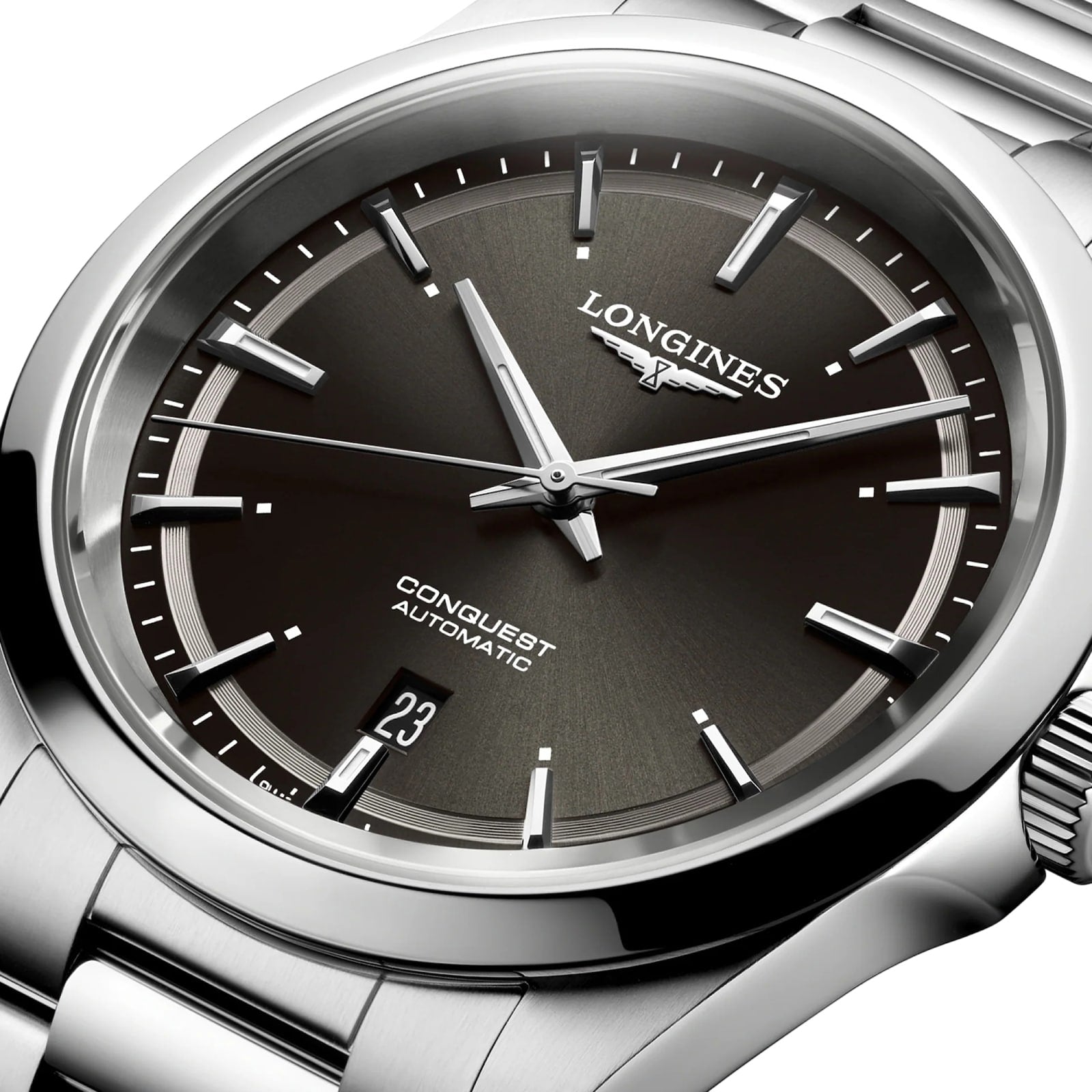 Close-up of a Longines Conquest Automatic wristwatch with black dial, silver hour markers, date window at 6 o’clock, and robust stainless steel case and bracelet.