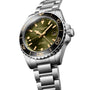 The Longines HydroConquest is a stainless steel diving watch featuring a green dial, black ceramic bezel, gold-tone hands and markers, date at 3 o’clock, and a metal bracelet.