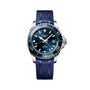 The Longines HydroConquest is a blue and silver diving watch featuring a blue rubber strap, rotating bezel, date display at 3 oclock, and luminescent hands and hour markers on a white dial.