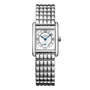 The Longines Mini DolceVita is a rectangular silver wristwatch featuring a metal link band, white dial with Roman numerals, and blue hands, blending elegance with contemporary style.