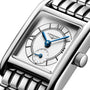 Close-up of the Longines Mini DolceVita, featuring a silver dial with blue hands, Roman numerals, small seconds subdial, and a sleek metal bracelet—a timeless icon of contemporary elegance.
