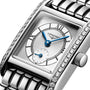 Close-up of the Longines Mini DolceVita watch featuring a rectangular silver dial, blue hands, Roman numerals, Top Wesselton diamond-set bezel, and a stainless steel bracelet.