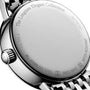 Close-up of the back of a Longines Elegant Collection Moonphase watch, highlighting engravings for model number, stainless steel, Swiss made, water resistance, and its precise quartz movement.